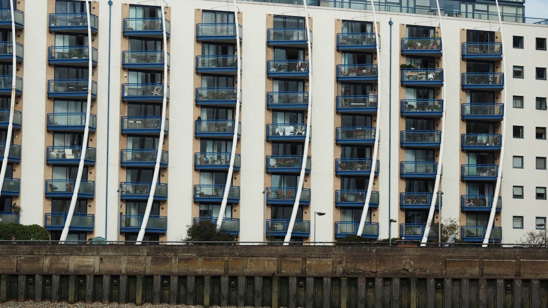 A multifamily apartment community in the afternoon sun