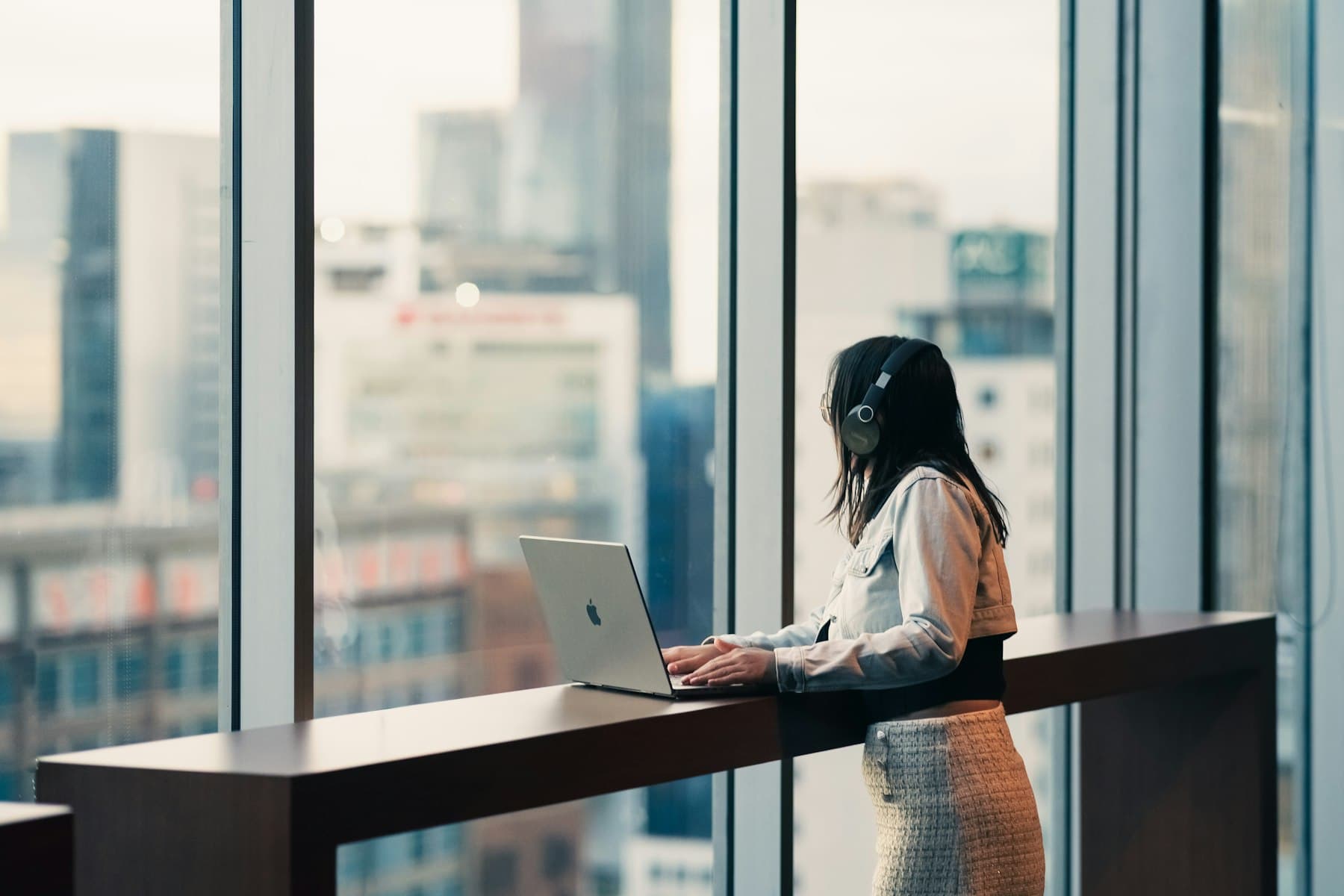 A property manager working at a laptop